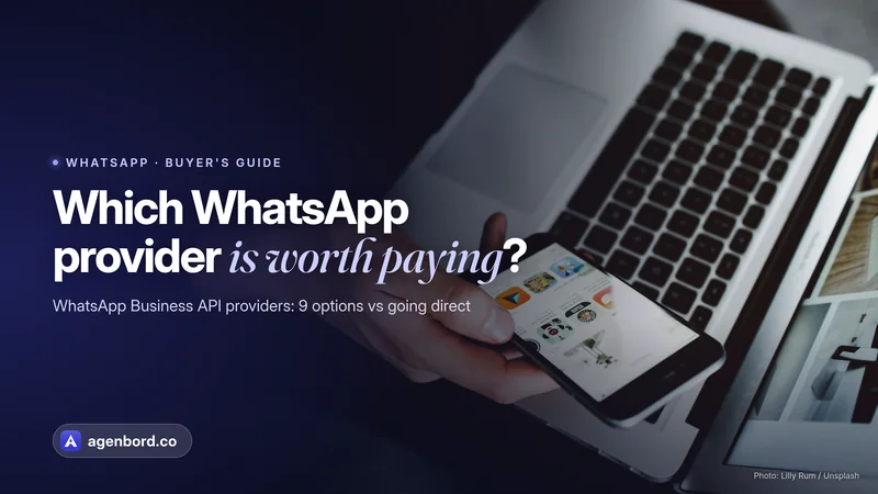 A hand holding a smartphone over an open laptop. Headline: Which WhatsApp provider is worth paying?